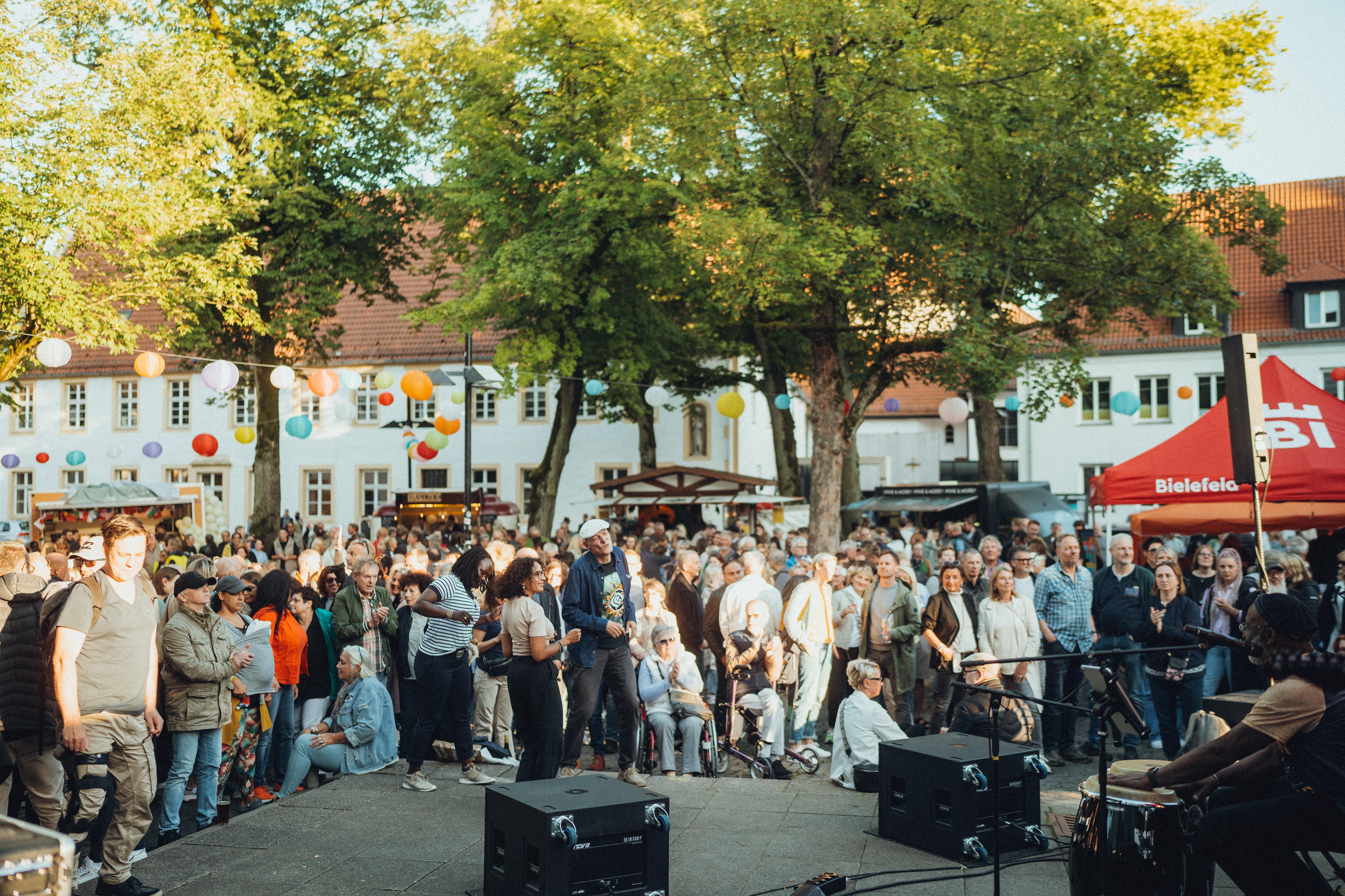 Adult City Concert Crowd Male Man Neighborhood People Person Shoe Street Urban