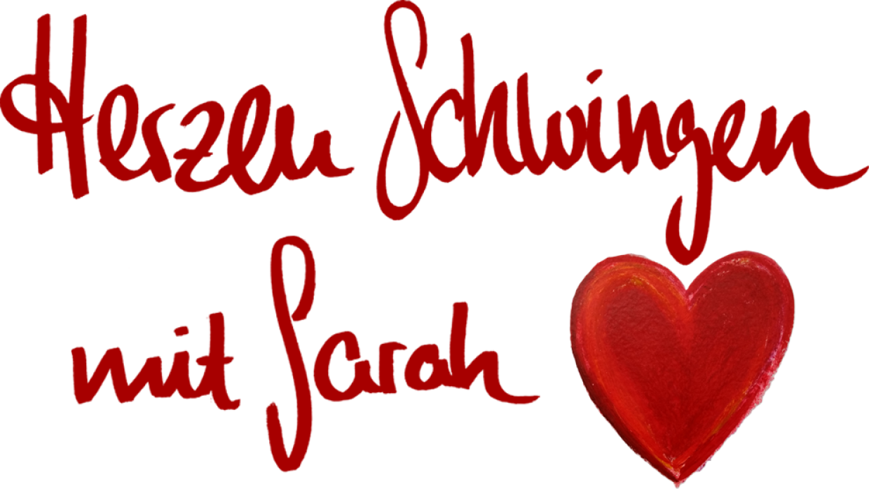 Ein rotes Herz mit Schrift auf weißen Grund