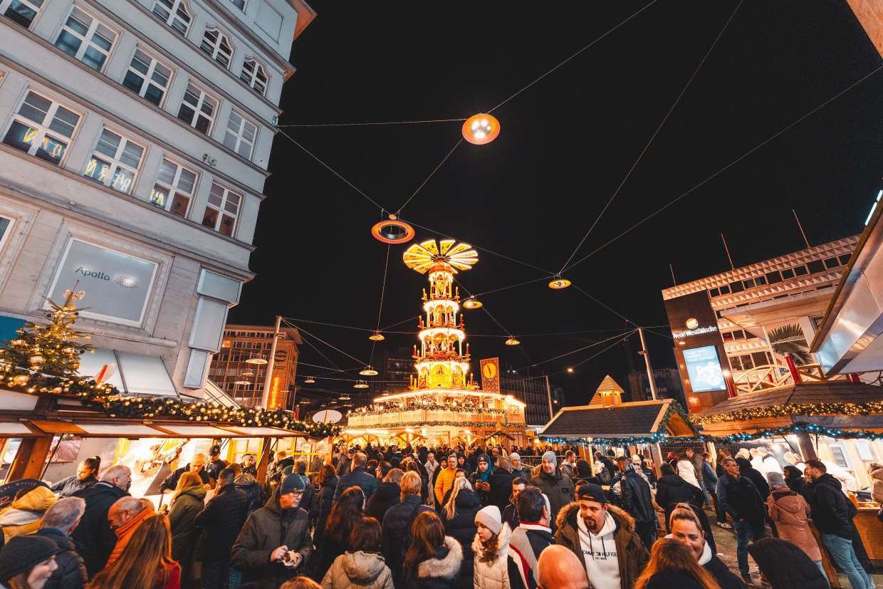 Adult Architecture Building City Clothing Female Hat Male Man Night Life People Person Urban Woman